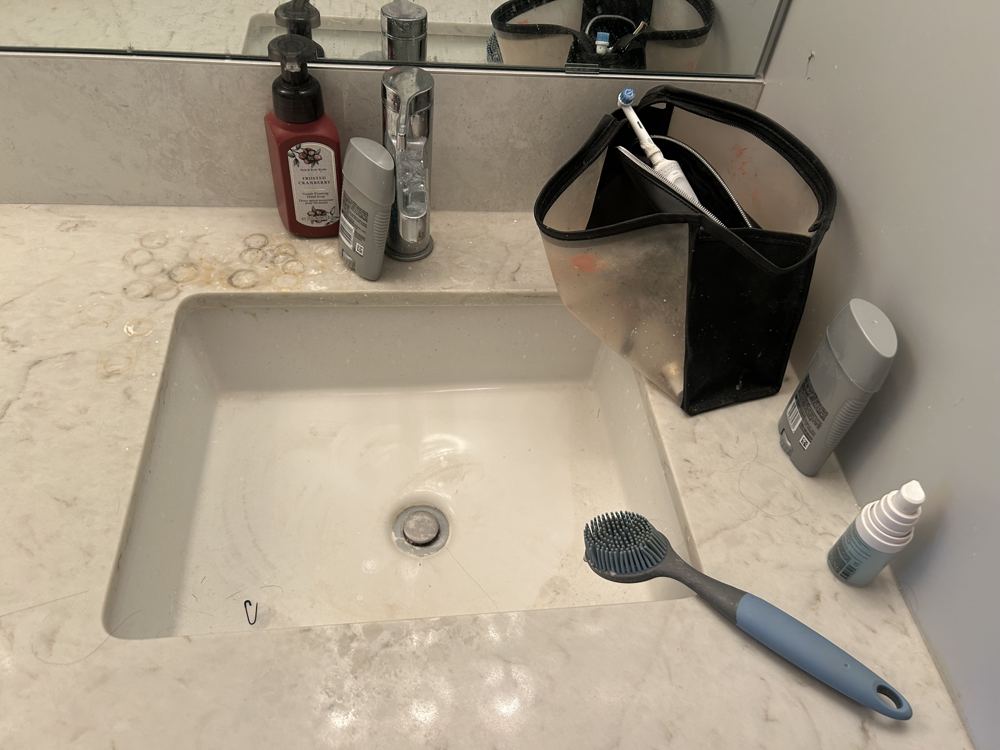 Bathroom vanity before cleaning